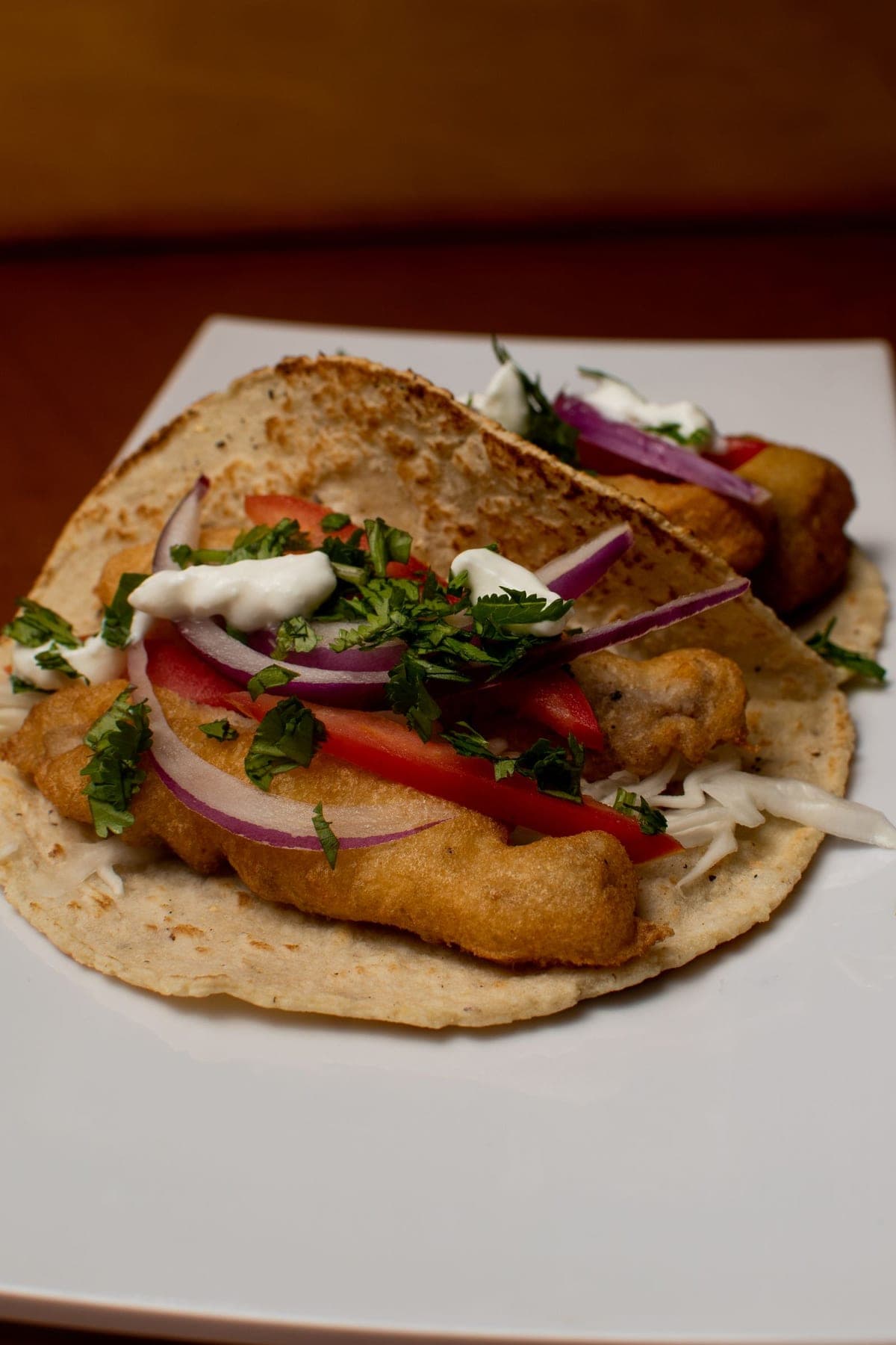 Fish tacos with slaw and sauce