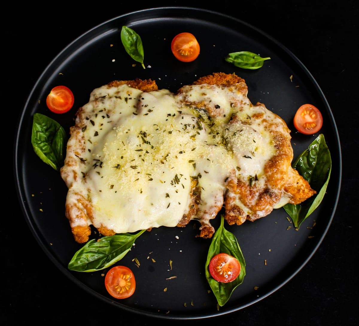 Chicken breast smothered in melted cheese