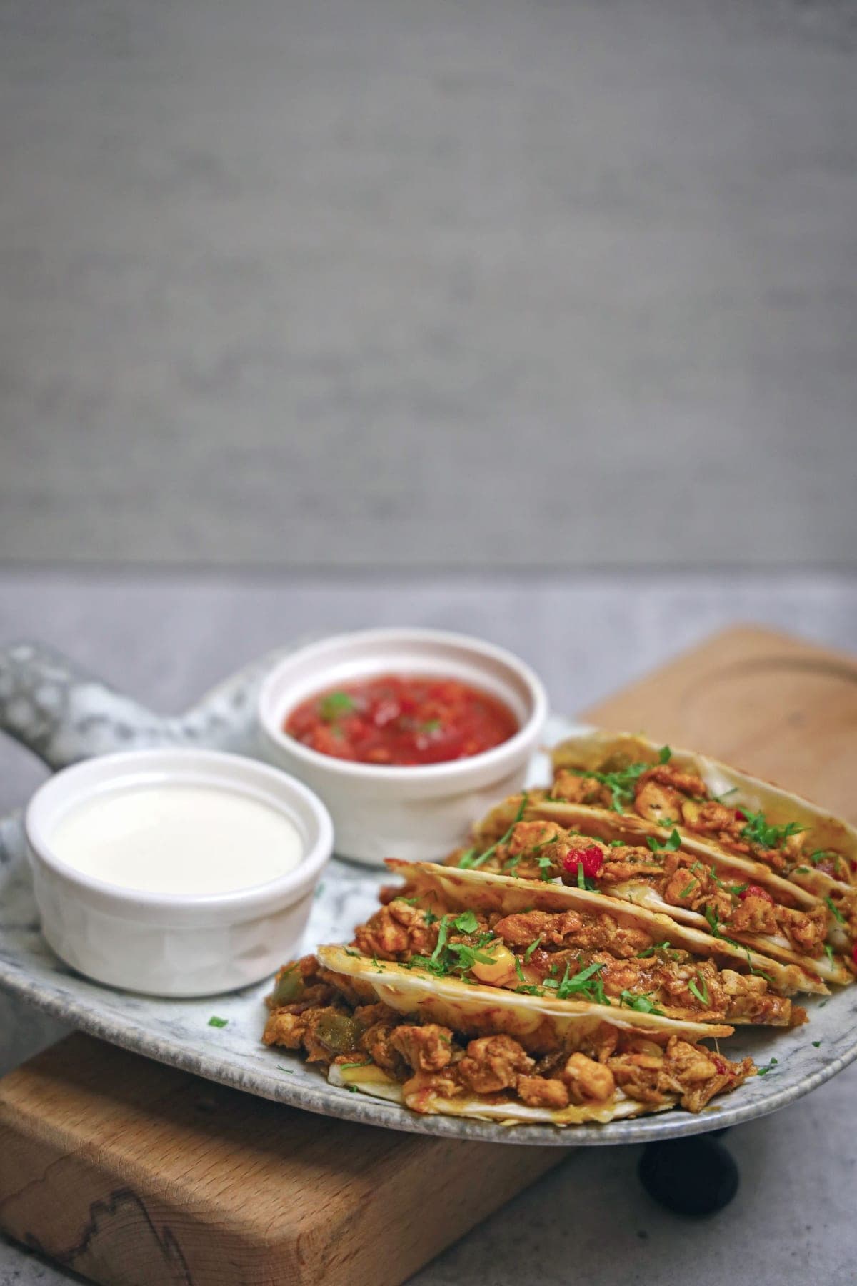 Chicken tacos with salsa and sour cream